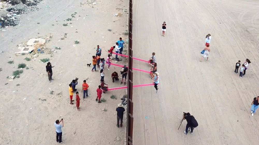 Teeter Totter Wall - pink seesaws across US-Mexico border_2