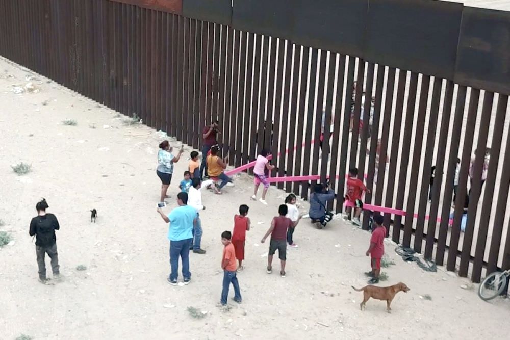 Teeter Totter Wall - pink seesaws across US-Mexico border