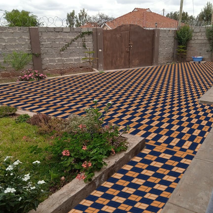 Garden path constructed from plastic waste by Kenyan women