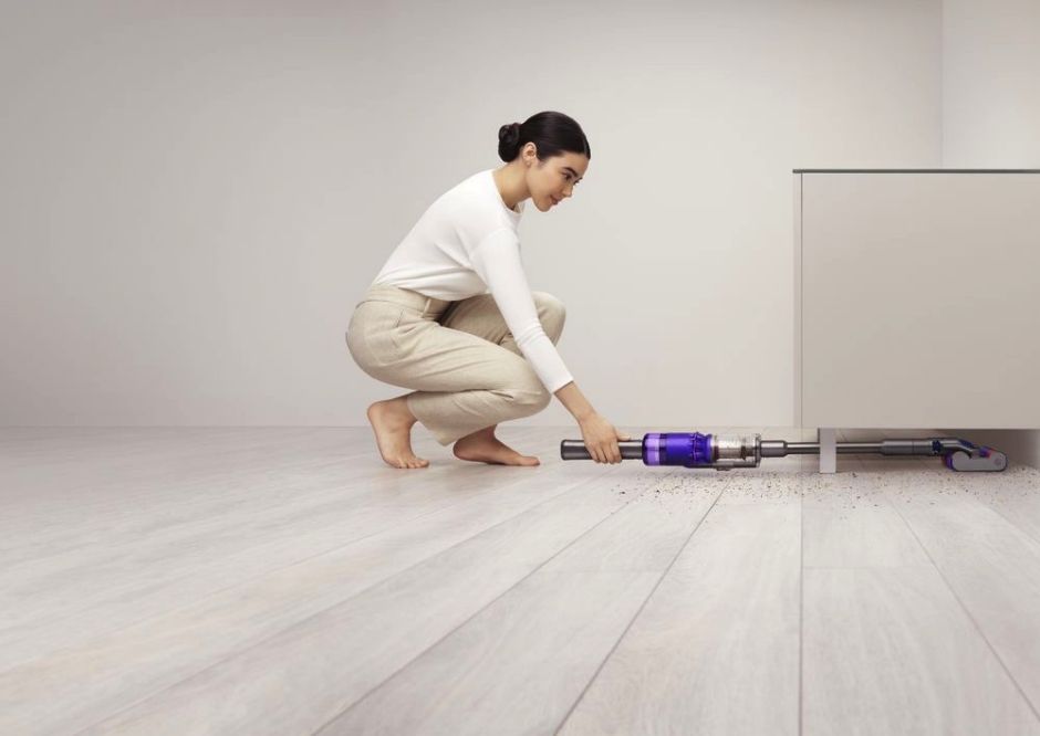 working with Dyson V15 vacuum cleaner