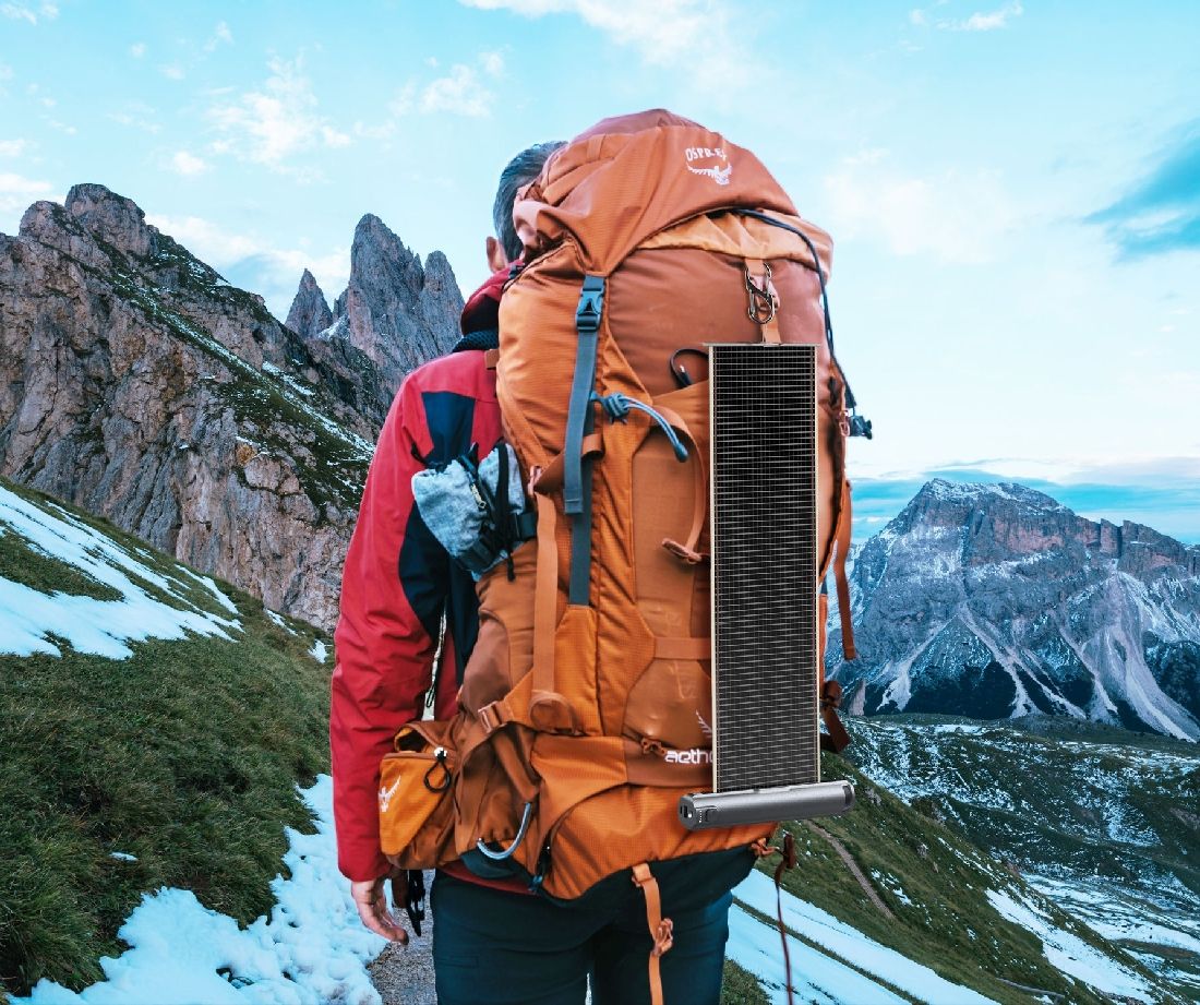 xsolar solar charger attached to backpack