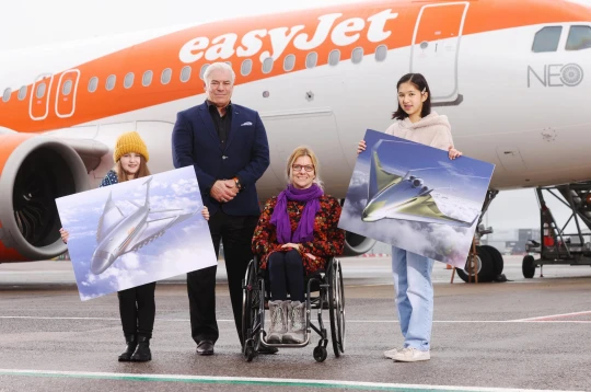 Cerys Armstrong and Lara Wong showing their plane design