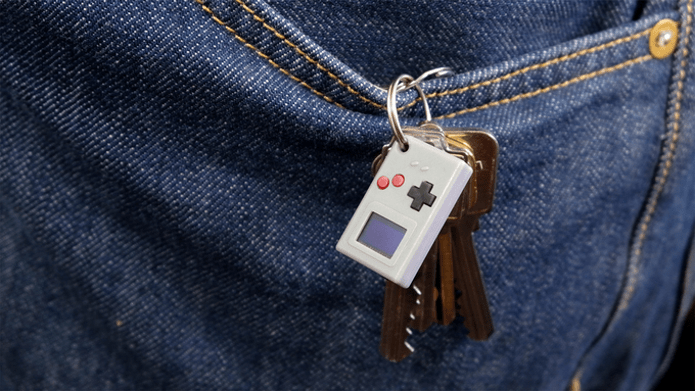 Thumby gameboy tucked in jeans pocket