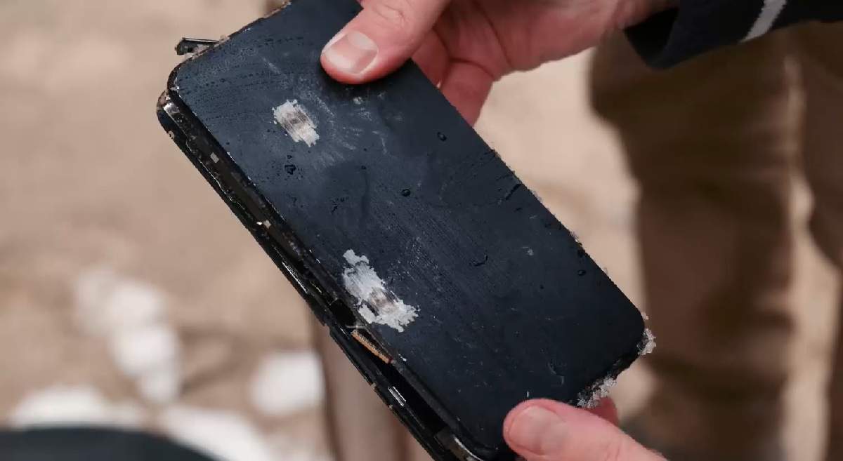 Caviar Stealth 2.0 phone damaged by bullet marks