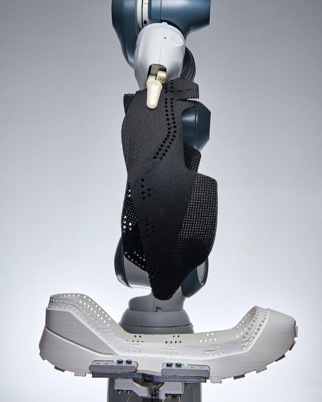 Robot working on RUEI-01 recyclable shoe