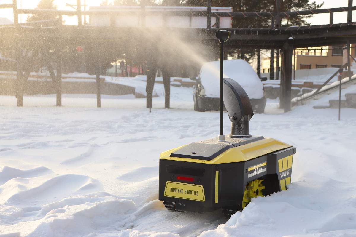 Snowbot S1 blowing snow from its chute