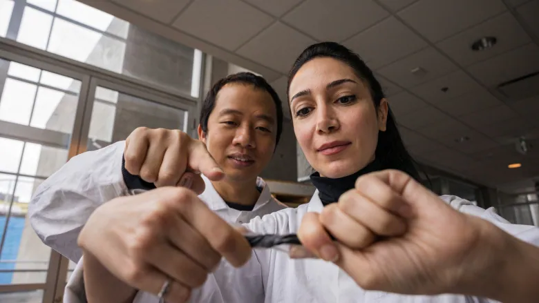 Doctor Nguyen and Bahar Iranpour working on washable battery project